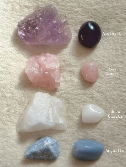 Close-up of rose quartz pendant resting against a Cancer woman's hand near her heart