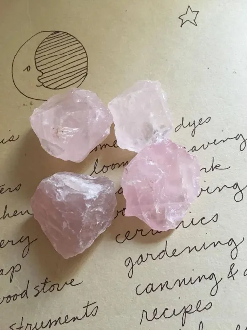 Close-up of rose quartz roller surface under light