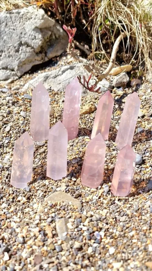 Rose quartz bracelet on wrist with Scorpio-inspired decor