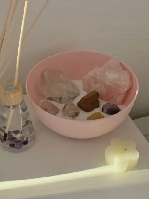 Rose quartz crystals arranged in Feng Shui compass formation